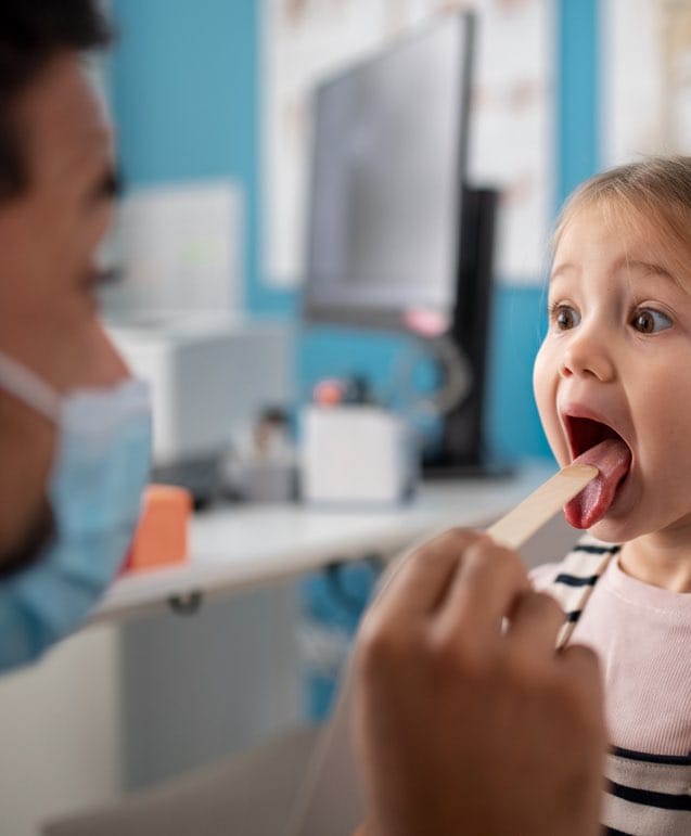 Little Girl Getting Throat Checked